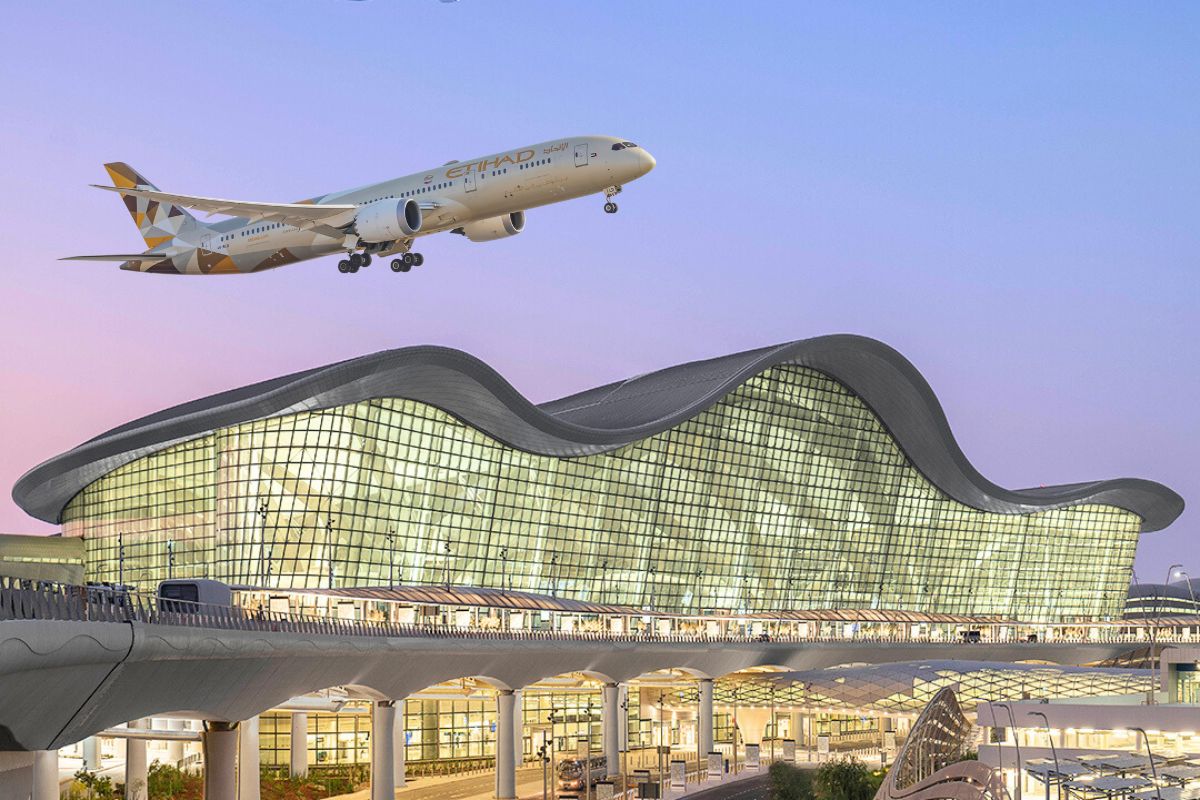 Etihad Airways Etihad airplane flying over Zayed International Airport