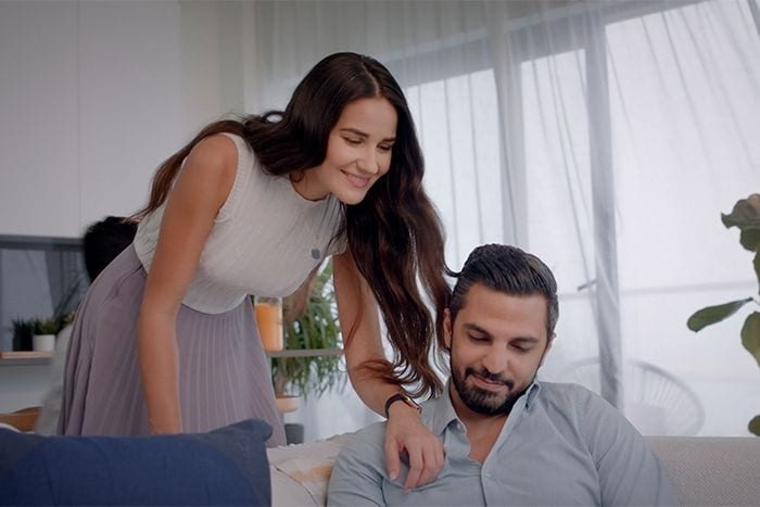 Husband and wife in living room an image by Imkan for Pixel A glimpse of what to expect at Reem Island’s latest architectural landmark – pixel by IMKAN properties
